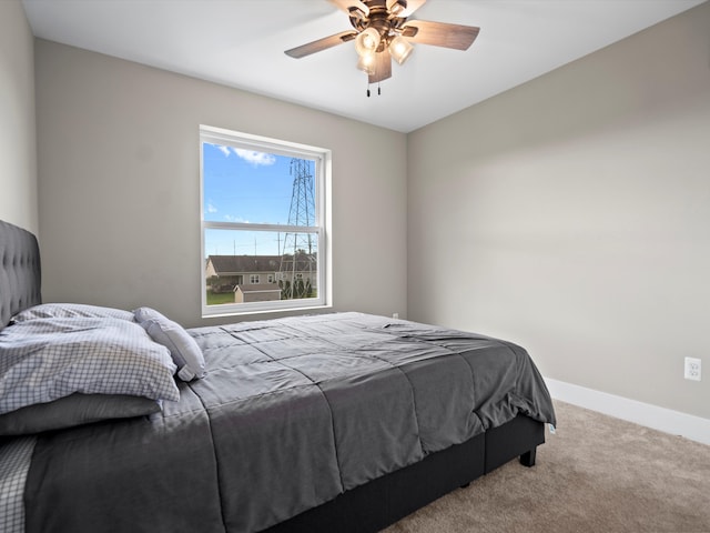 bedroom featuring carpet and ceiling fan