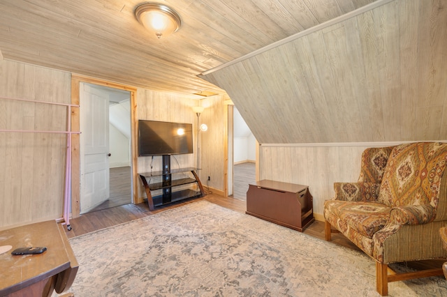 bonus room featuring hardwood / wood-style flooring, wood walls, wood ceiling, and vaulted ceiling