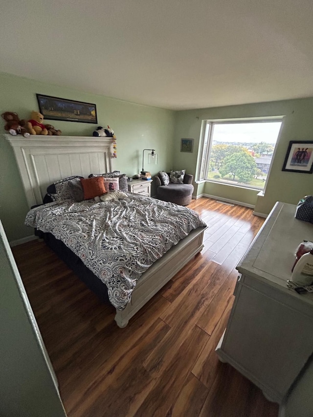 bedroom featuring dark hardwood / wood-style floors