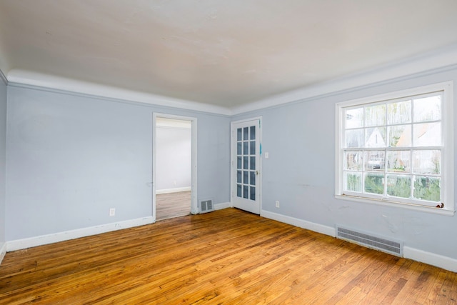 empty room featuring light hardwood / wood-style floors