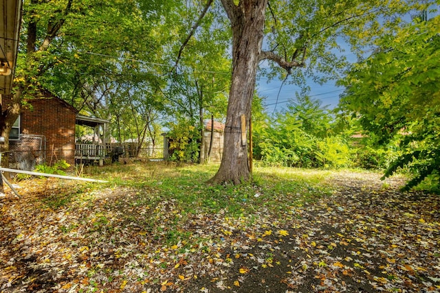 view of yard with a deck