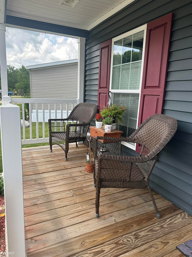 wooden terrace with covered porch