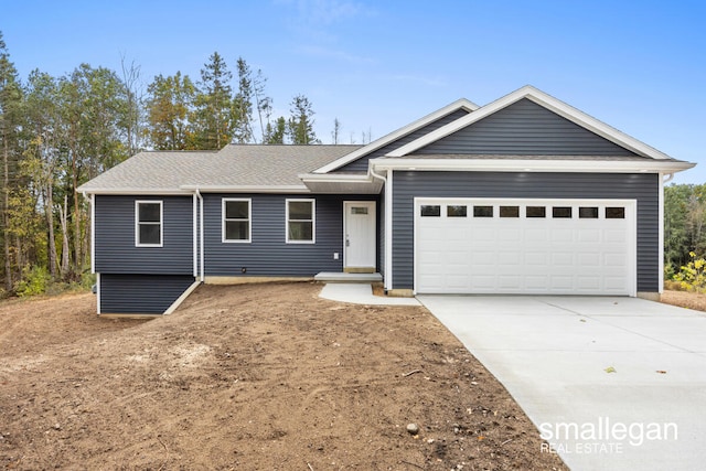 ranch-style home with a garage