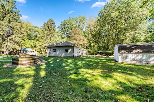 view of yard with a storage shed