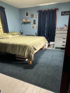 bedroom featuring carpet flooring