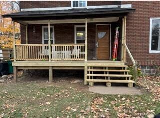 back of house with a porch