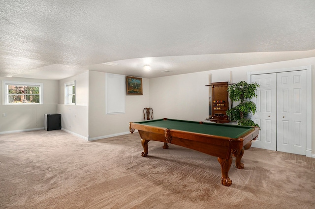 game room with carpet flooring, a textured ceiling, and billiards