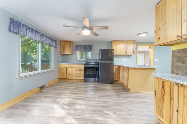 kitchen featuring light hardwood / wood-style flooring, ceiling fan, stainless steel fridge, range with electric stovetop, and light brown cabinetry