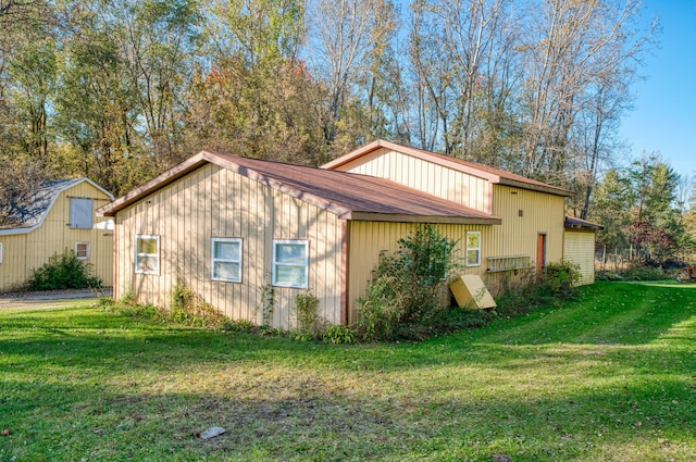 view of home's exterior featuring a yard