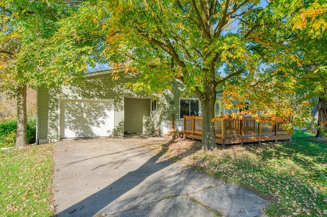 view of front of home featuring a garage and a deck