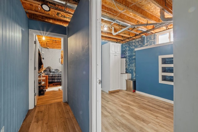 corridor featuring light hardwood / wood-style flooring