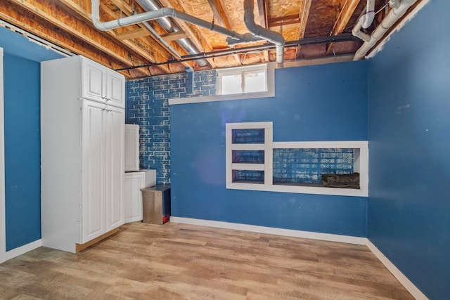 basement with light wood-type flooring