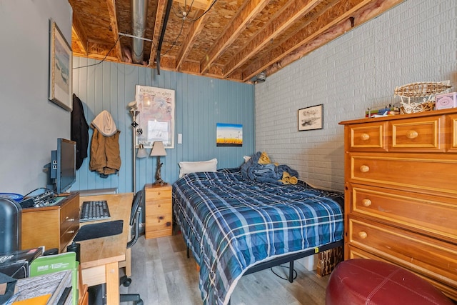 bedroom with light wood-type flooring