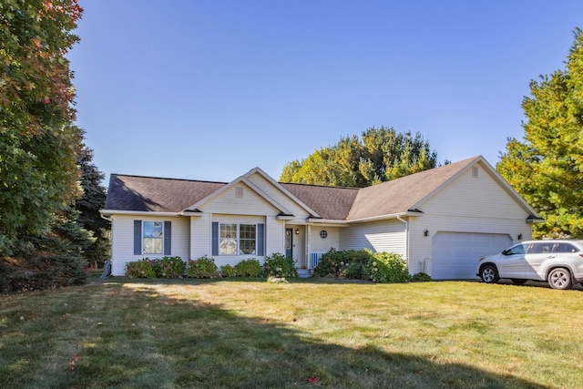 single story home featuring a front lawn and a garage