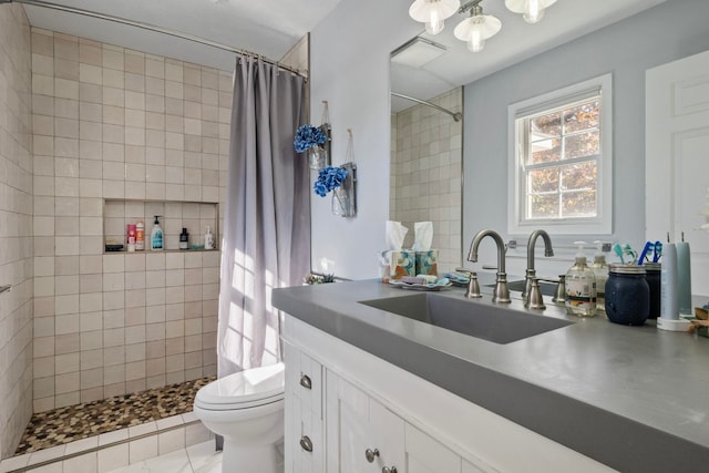 bathroom with walk in shower, tile patterned flooring, vanity, and toilet