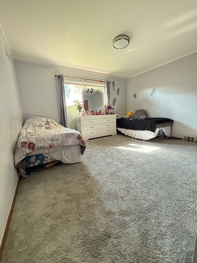 carpeted bedroom with crown molding