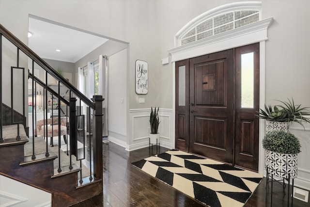 foyer entrance featuring dark hardwood / wood-style flooring