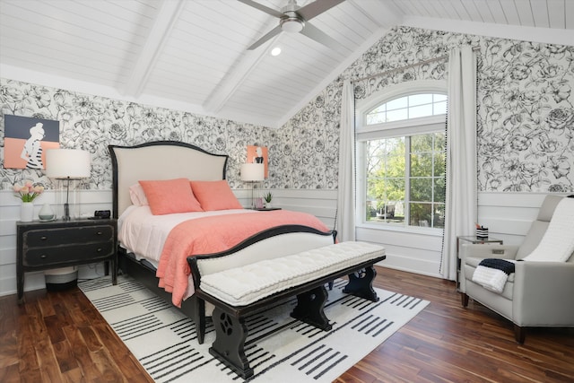 bedroom with ceiling fan, dark wood-type flooring, and vaulted ceiling