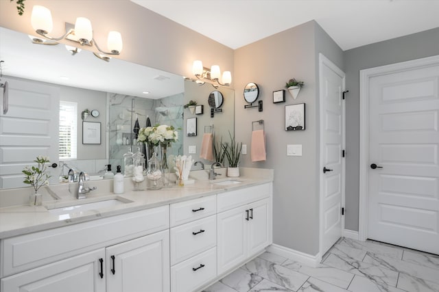 bathroom featuring vanity, a shower with shower door, and a chandelier