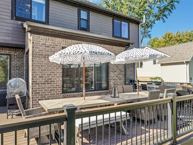 wooden deck with area for grilling