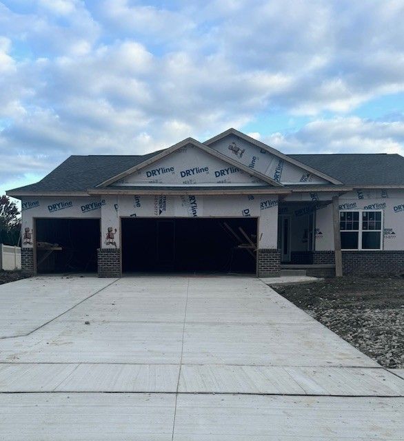 property under construction with a garage