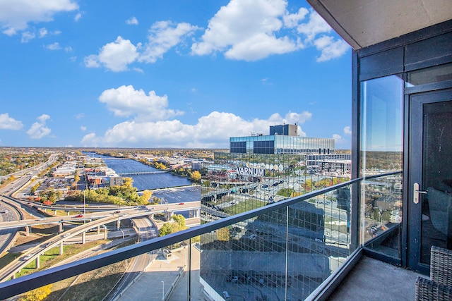 balcony featuring a water view