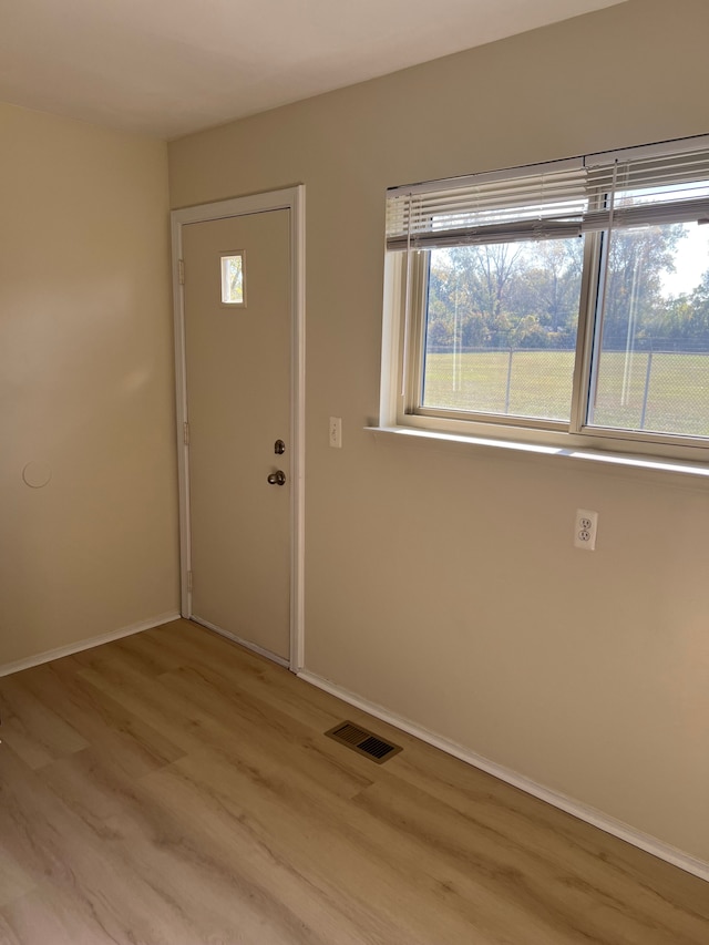 foyer entrance featuring light hardwood / wood-style floors