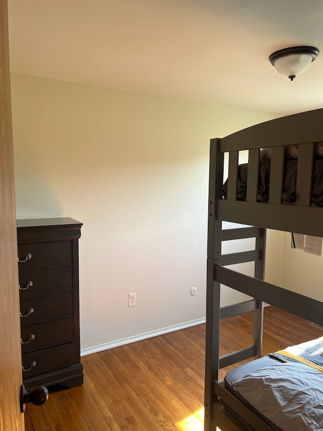 bedroom featuring hardwood / wood-style flooring