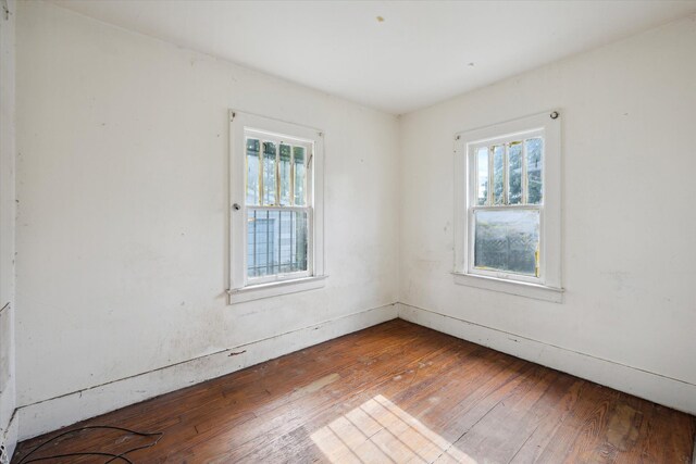 2515 Bagley St, Flint, MI 48504 - unfurnished room featuring hardwood / wood-style flooring and healthy amount of natural light