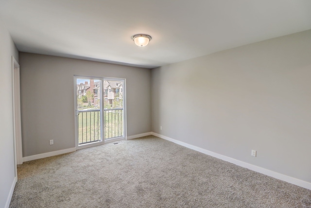 unfurnished room featuring carpet floors