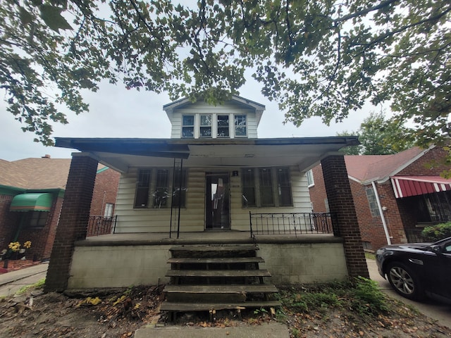 bungalow-style home featuring covered porch