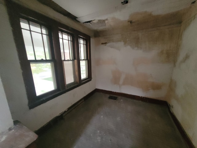 empty room with concrete floors