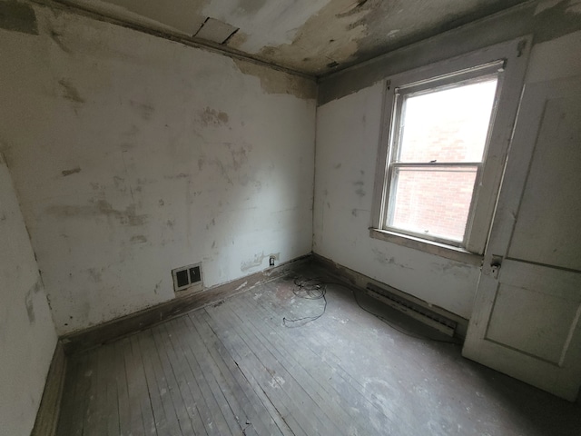 spare room with light wood-type flooring