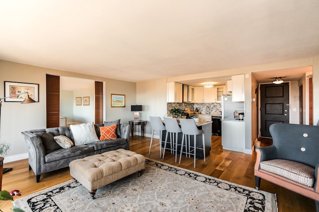 living room featuring dark hardwood / wood-style flooring