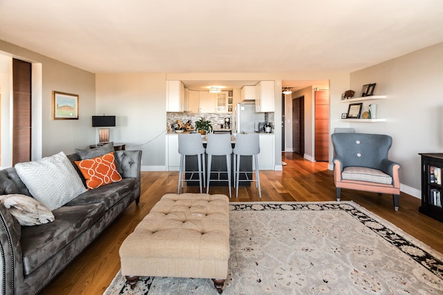 living room featuring dark wood-type flooring