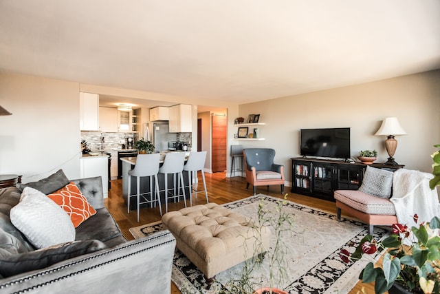 living room with dark hardwood / wood-style floors