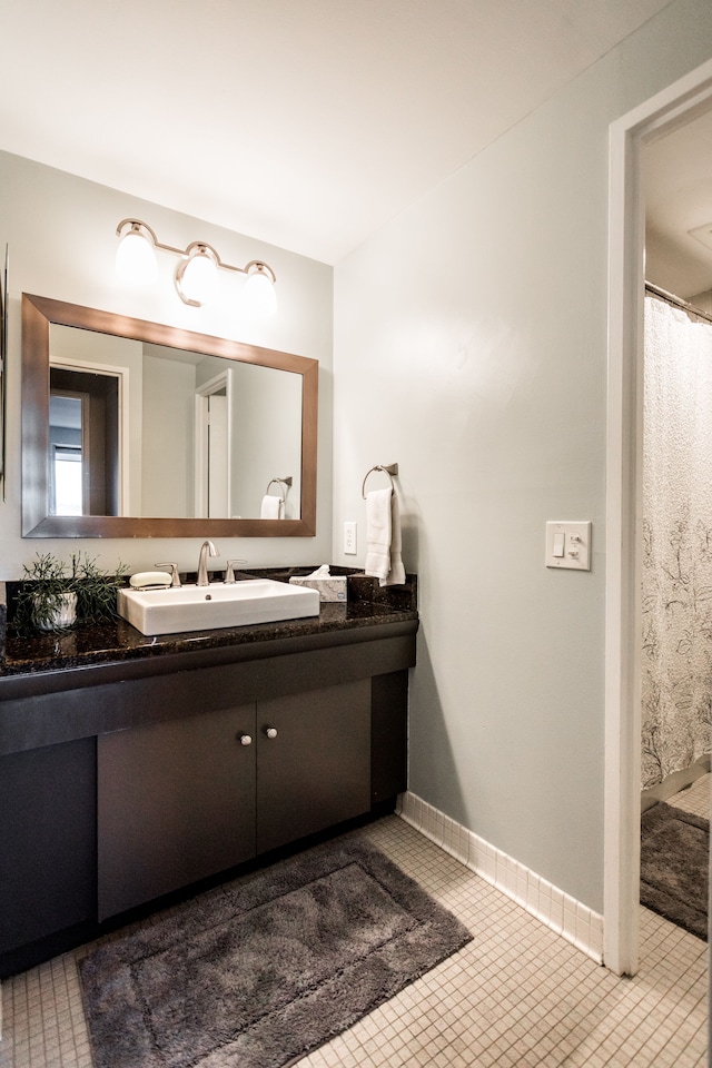 bathroom featuring vanity and tile patterned floors