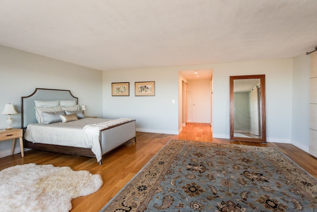 bedroom featuring light hardwood / wood-style flooring