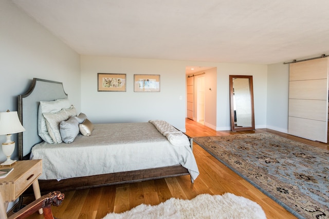 bedroom featuring light wood-type flooring