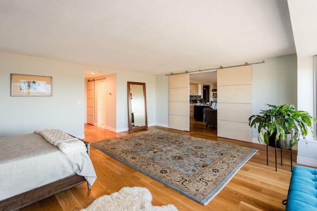 bedroom featuring light hardwood / wood-style floors