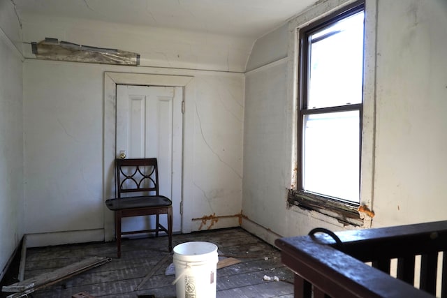 spare room featuring vaulted ceiling