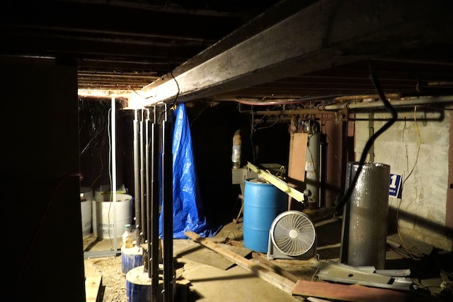 basement featuring gas water heater