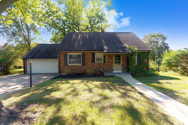 view of front of home featuring a garage and a front lawn