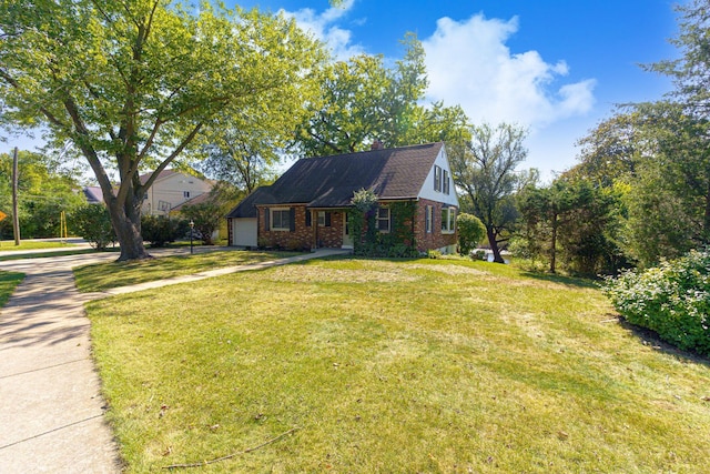 view of front of home with a garage and a front lawn