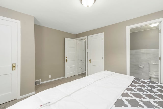 5721 Corunna Ave, Clarkston, MI 48346 - carpeted bedroom with baseboards and connected bathroom