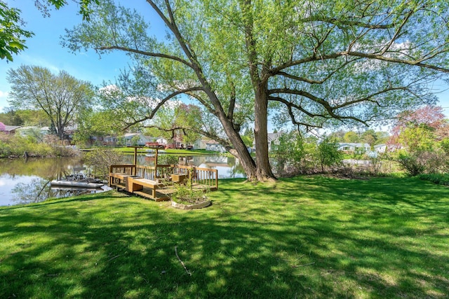 5721 Corunna Ave, Clarkston, MI 48346 - dock area featuring a water view and a lawn