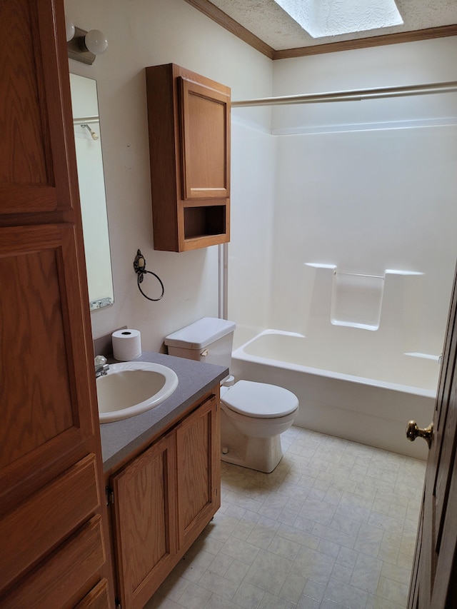 full bath with shower / bath combination, toilet, tile patterned floors, a textured ceiling, and vanity