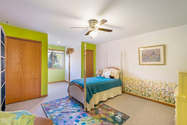 bedroom featuring light colored carpet and ceiling fan