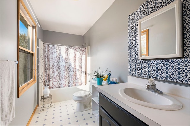 full bathroom featuring shower / tub combo with curtain, vanity, and toilet