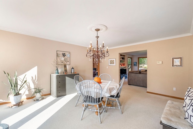 dining space featuring light carpet, crown molding, and an inviting chandelier